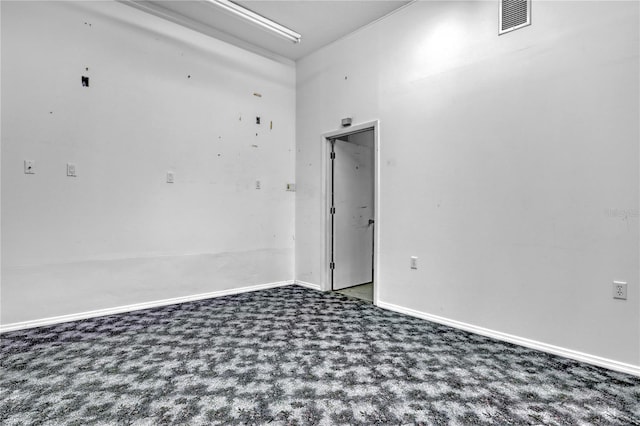 unfurnished room with carpet