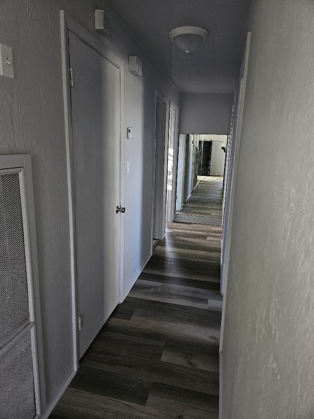 hall featuring dark hardwood / wood-style flooring