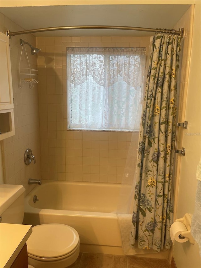 full bathroom featuring vanity, toilet, and shower / tub combo