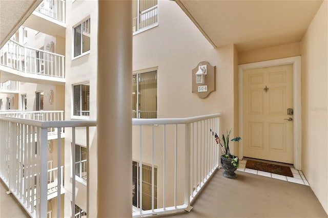 doorway to property featuring a balcony