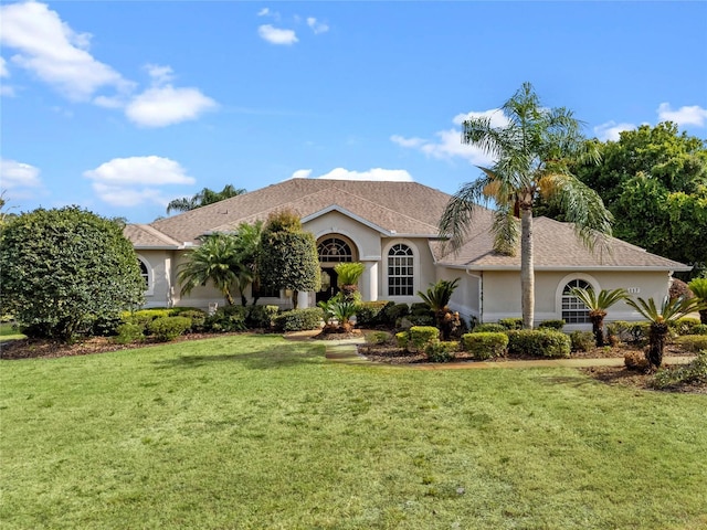 view of front of home with a front lawn