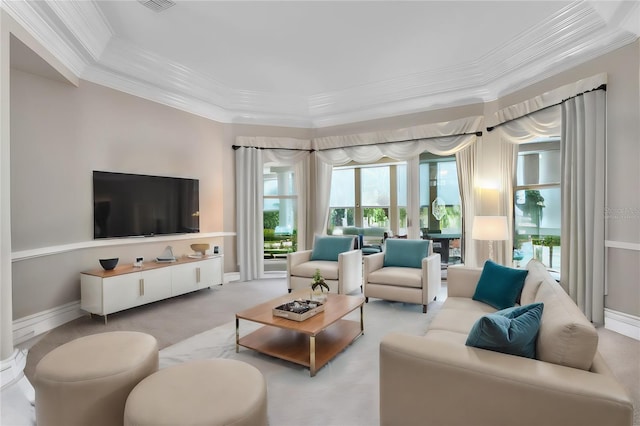 living room with light colored carpet and ornamental molding