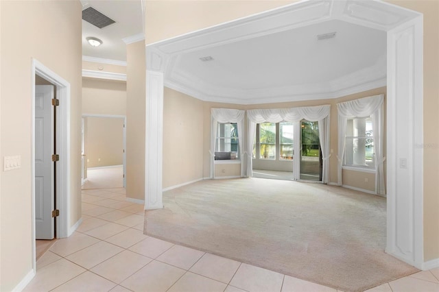 carpeted spare room with crown molding