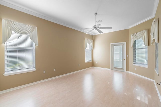 unfurnished room featuring ceiling fan, ornamental molding, and light hardwood / wood-style flooring