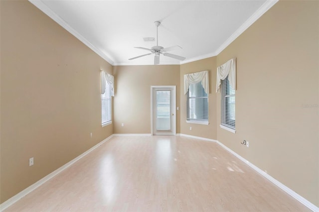 unfurnished room featuring light hardwood / wood-style flooring, ceiling fan, and crown molding