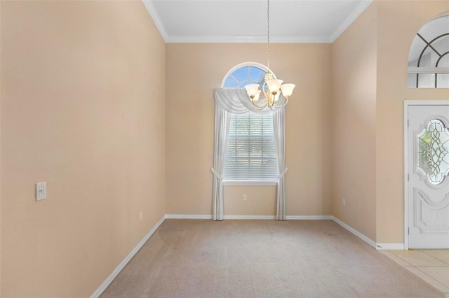 carpeted entryway with crown molding and a chandelier