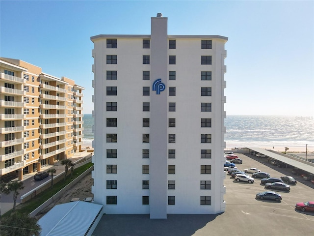 view of property with a water view