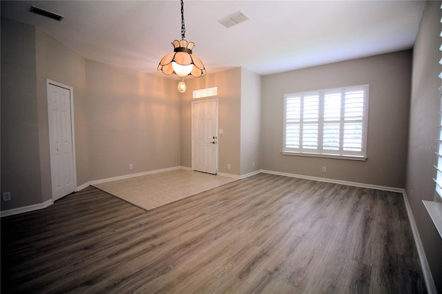 empty room featuring tile flooring