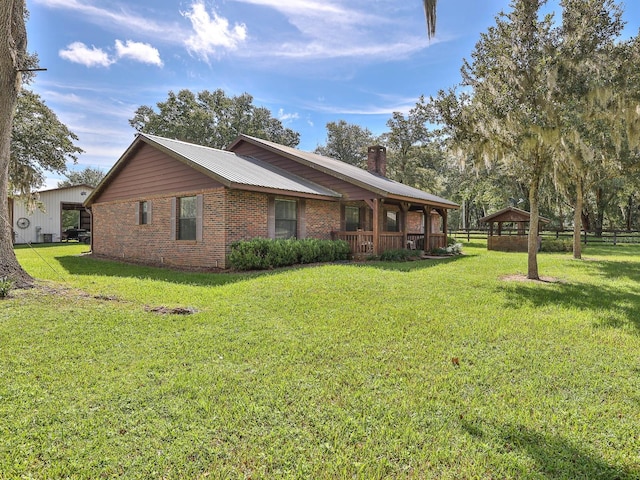 view of property exterior with a lawn