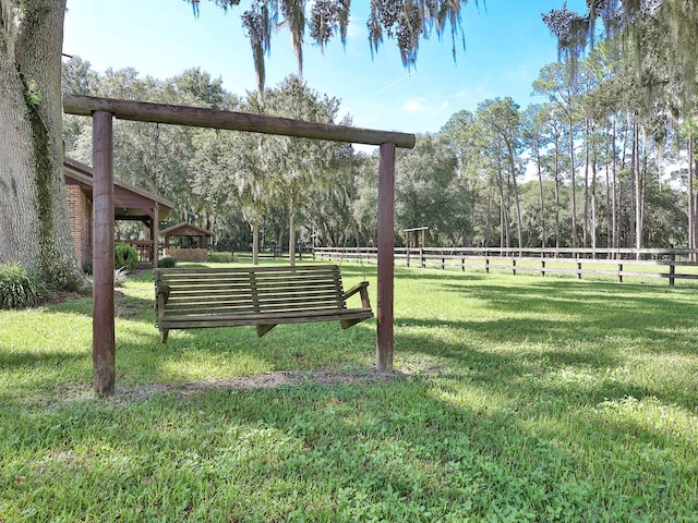 view of nearby features featuring a yard