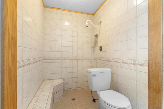 bathroom featuring toilet, a shower, tile walls, and tile patterned floors