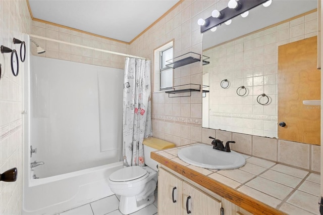 full bathroom with tile patterned flooring, shower / bath combo, and tile walls