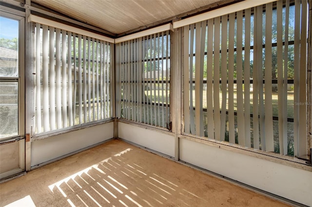 unfurnished sunroom featuring plenty of natural light