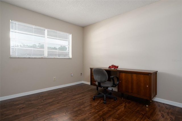 office featuring dark hardwood / wood-style flooring and a textured ceiling