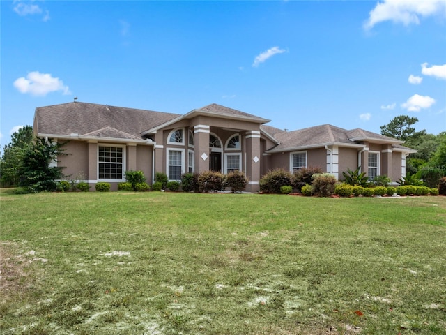 view of front of property with a front yard