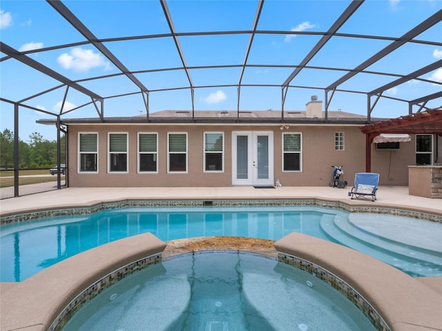 view of swimming pool featuring an AC wall unit, french doors, glass enclosure, and an in ground hot tub