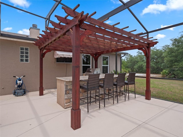 view of terrace with a pergola and an outdoor bar