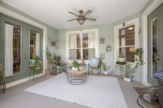 exterior space with french doors and ceiling fan