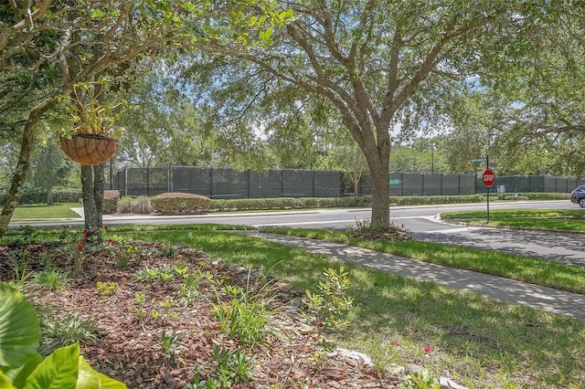 view of yard featuring basketball court