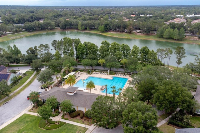 drone / aerial view with a water view