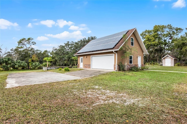 view of property exterior featuring solar panels, a yard, and a storage shed