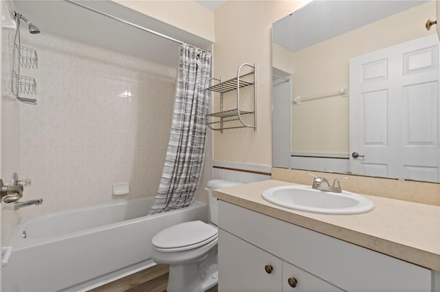 full bathroom with shower / bathtub combination with curtain, wood-type flooring, vanity, and toilet