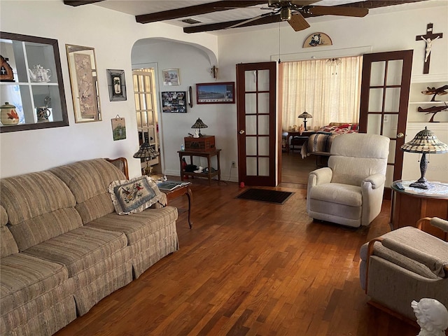 living room featuring beam ceiling, french doors, ceiling fan, and hardwood / wood-style floors