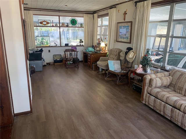 sunroom featuring wood ceiling