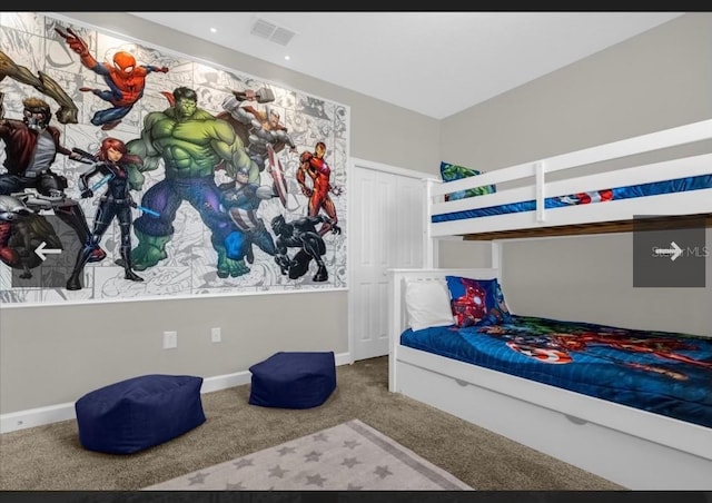 carpeted bedroom featuring a closet