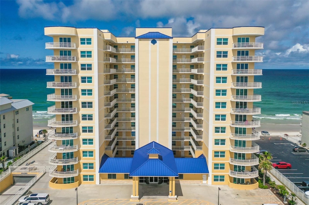 view of building exterior with a water view