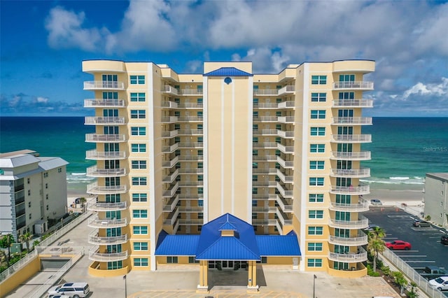 view of building exterior featuring a water view