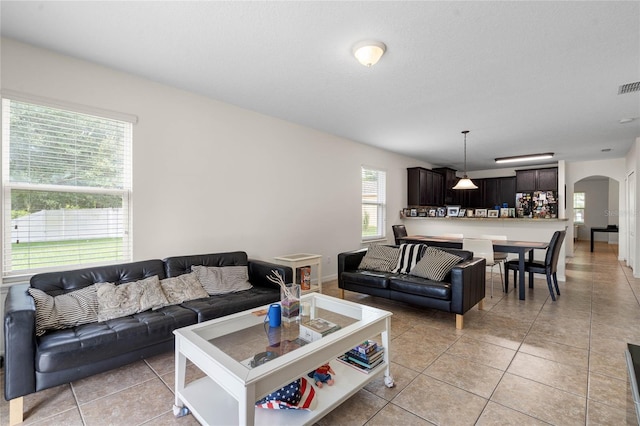 living room featuring light tile patterned floors