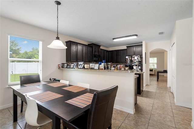 dining room with light tile patterned floors