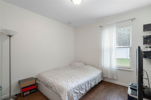 bedroom featuring hardwood / wood-style flooring