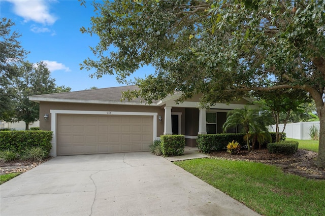 view of front of home with a garage