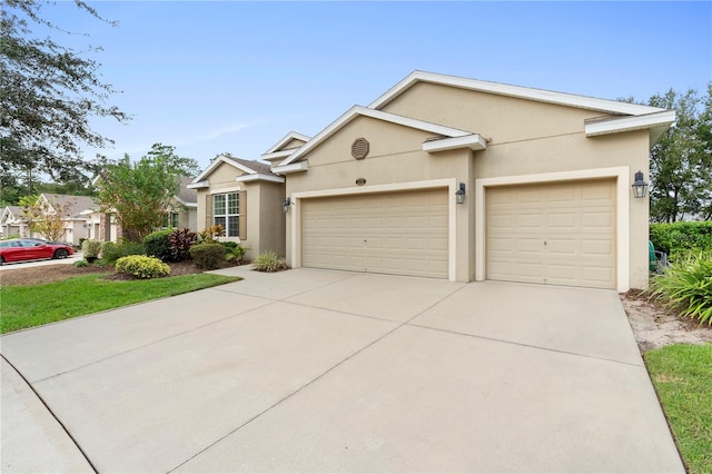 single story home featuring a garage