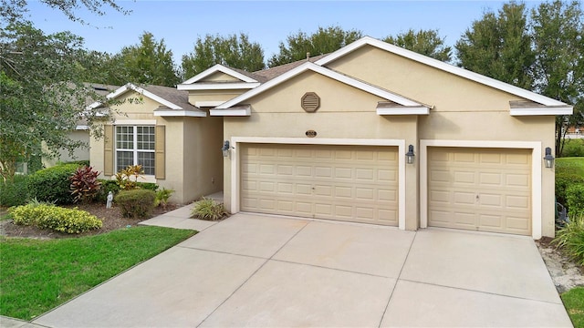 ranch-style home with a garage