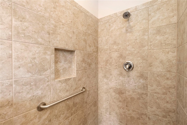 details featuring a tile shower