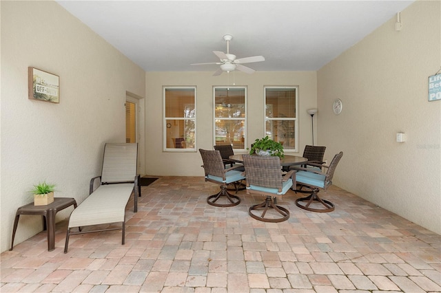 dining space featuring ceiling fan