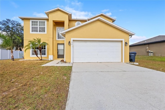 view of front of home featuring a front yard and a garage