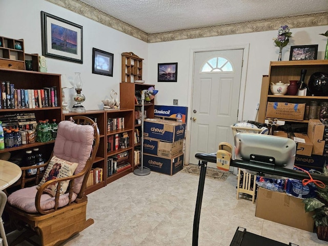 office area with a textured ceiling