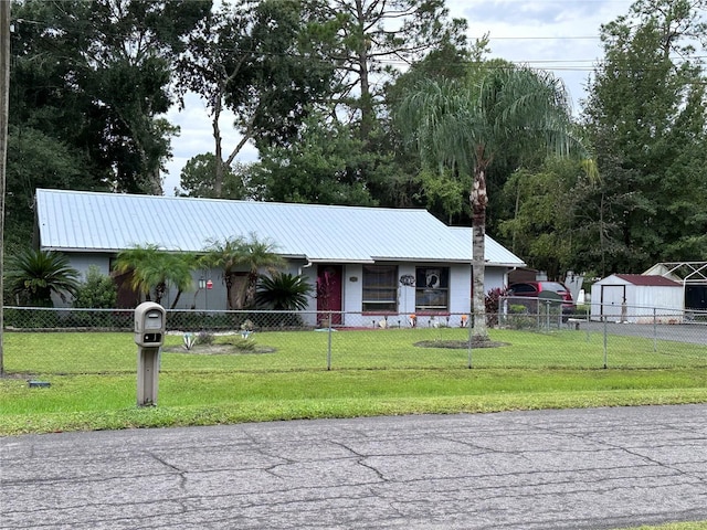 ranch-style house with a front yard