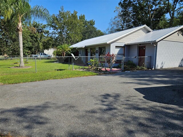 view of front of property with a front lawn