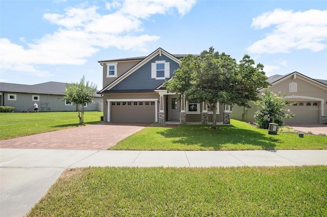 craftsman-style home with a garage and a front yard