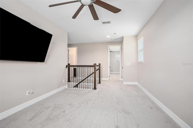 interior space featuring light colored carpet