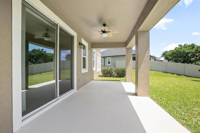 view of patio featuring ceiling fan