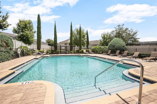 view of swimming pool featuring a patio