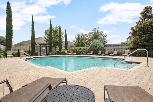 view of swimming pool featuring a patio