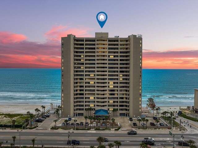 exterior space featuring a view of the beach