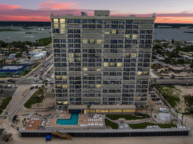 outdoor building at dusk with a water view